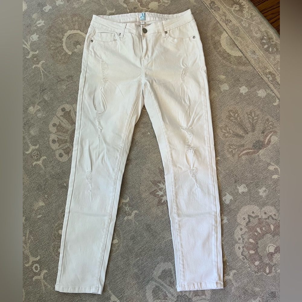 Distressed boutique white jeans